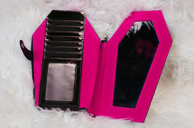 Why The Death Candy wallet will no longer have glitter pink patent.